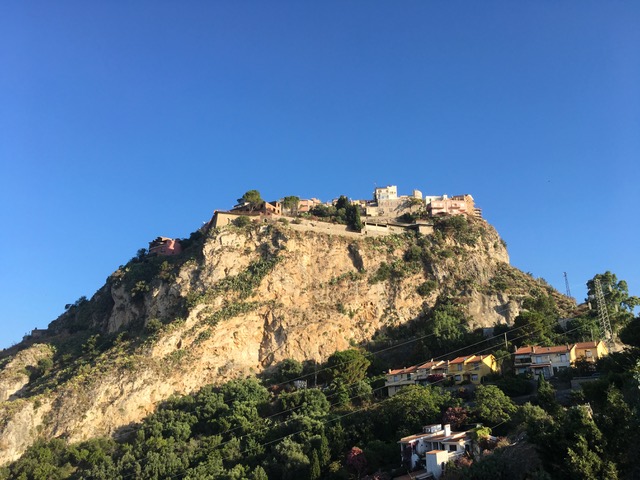 Craggy Castelmola, susepnded from its peak